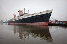 The SS United States moored in Philadelphia in 2008. The grand ocean liner's fate has been the subject of years of debate.